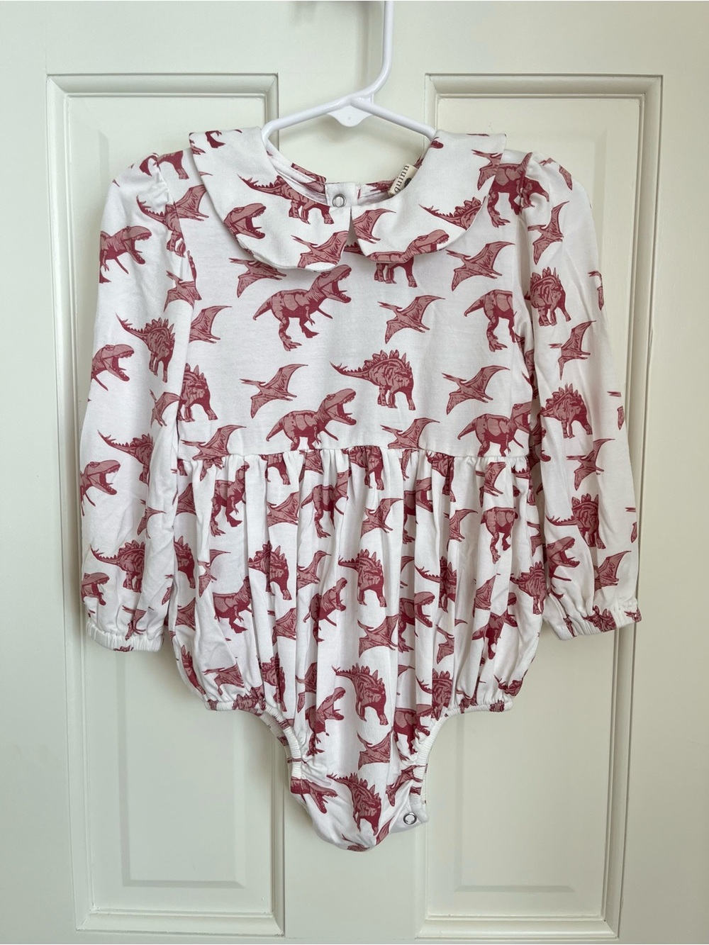 Kate Quinn Peter Pan Collared White Romper with Dusty Rose Dinosaur Print